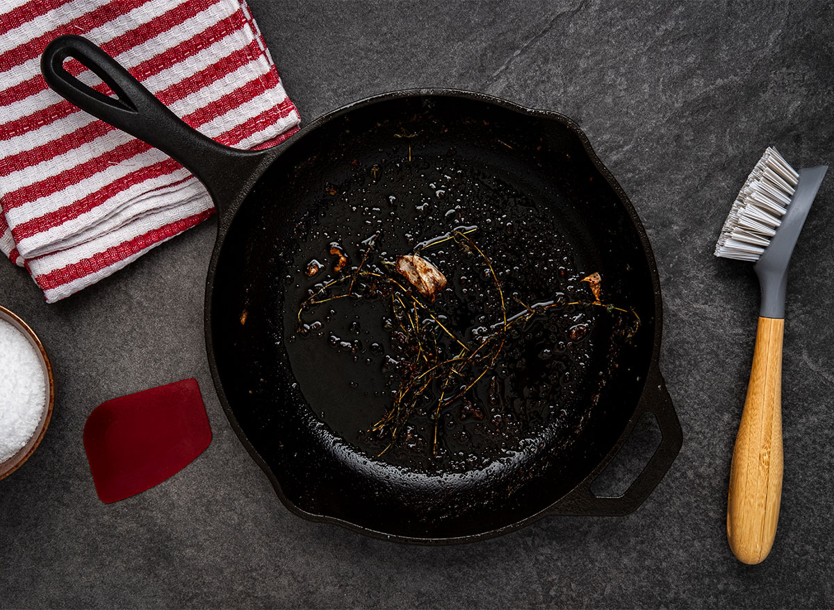 cast iron skillet with scrub brush