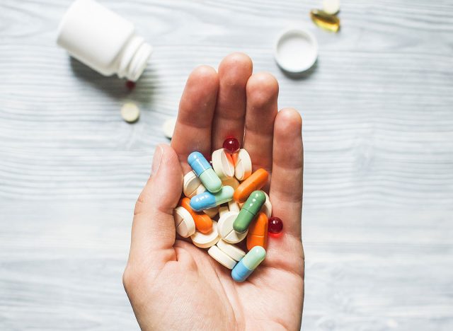 Colorful pills and medicine in the hand