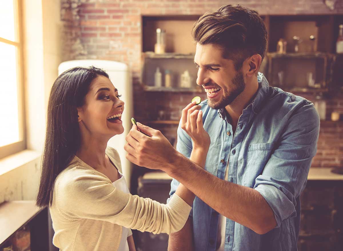 couple feeding each other