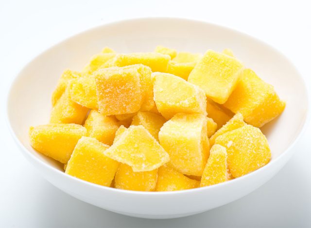 frozen mango pieces in a bowl