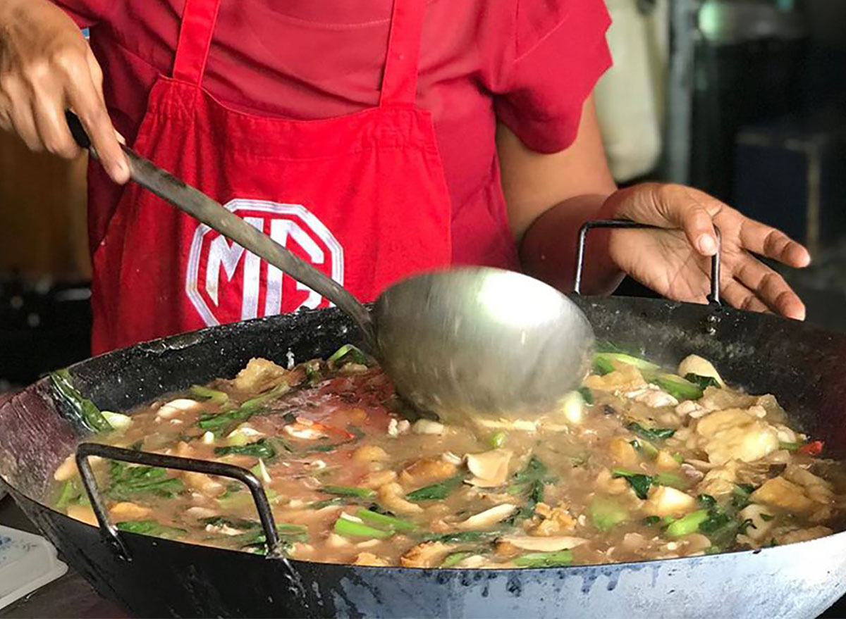 kalaya restaurant bowl of soup with person ladling