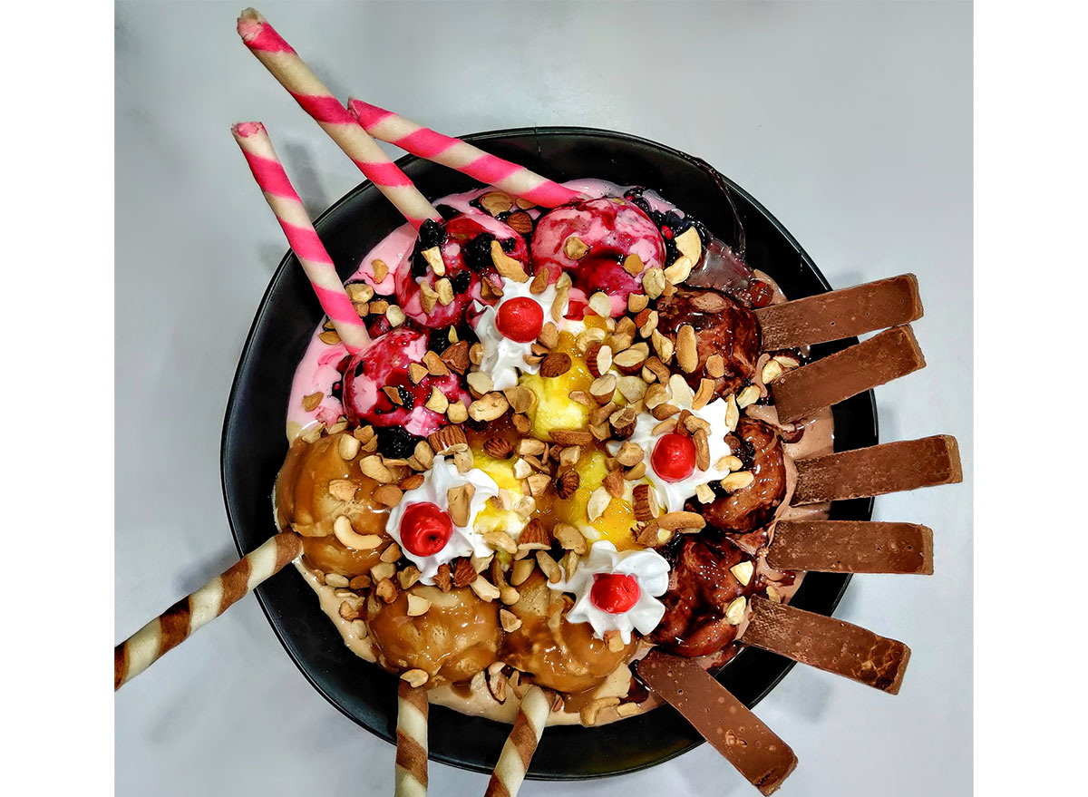 loaded ice cream sundae with nuts and candy