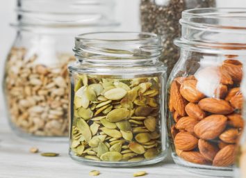 https://www.eatthis.com/wp-content/uploads/sites/4/2020/04/magnesium-pumpkin-seeds-almonds.jpg?quality=82&strip=all&w=354&h=256&crop=1