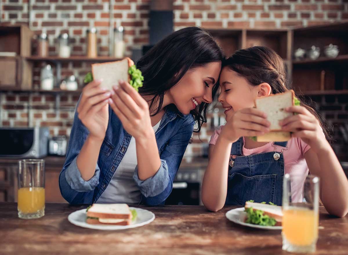 mother daughter eating together