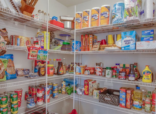 organized pantry stocked shelves