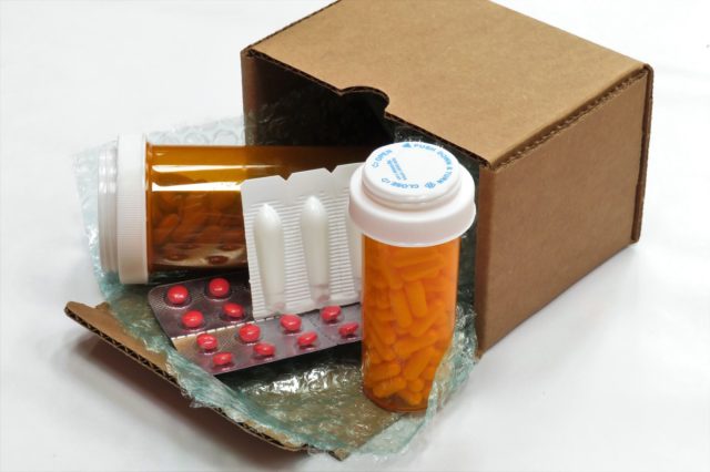 box of compounded prescription medications shipped from a mail order pharmacy