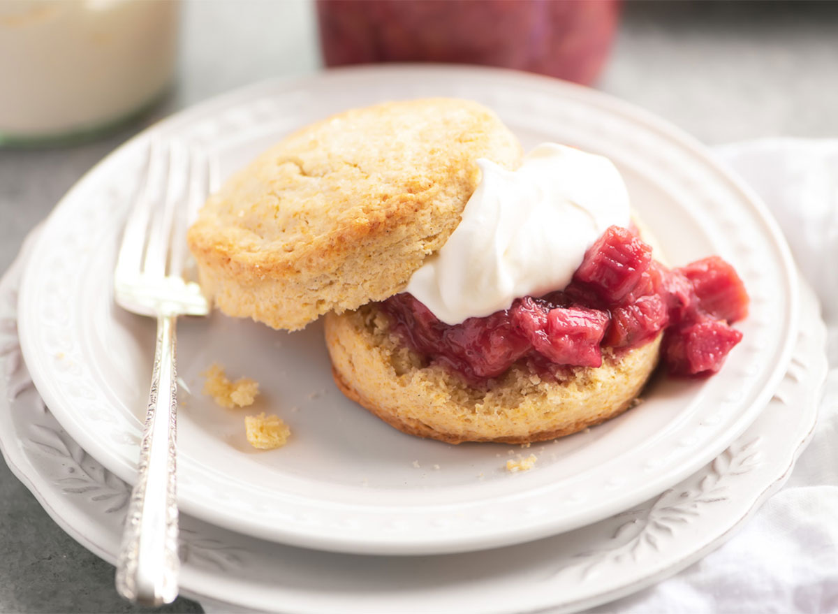 shortcake topped with whipped cream and rhubarb