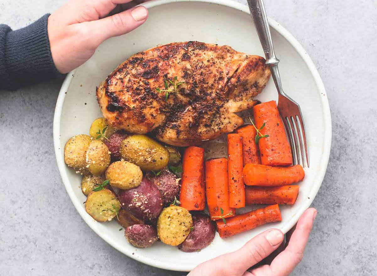 Sheet pan chicken with potatoes and carrots