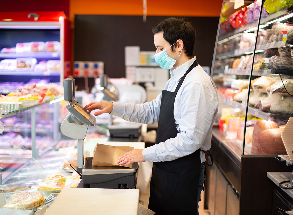 shop employee with mask