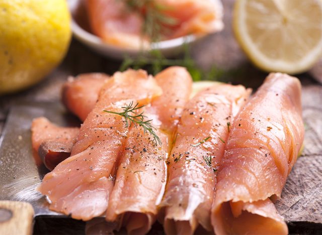 slices of smoked salmon on wooden board