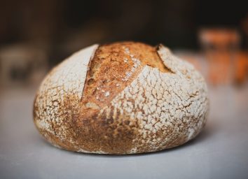 loaf of sourdough bread on a counter