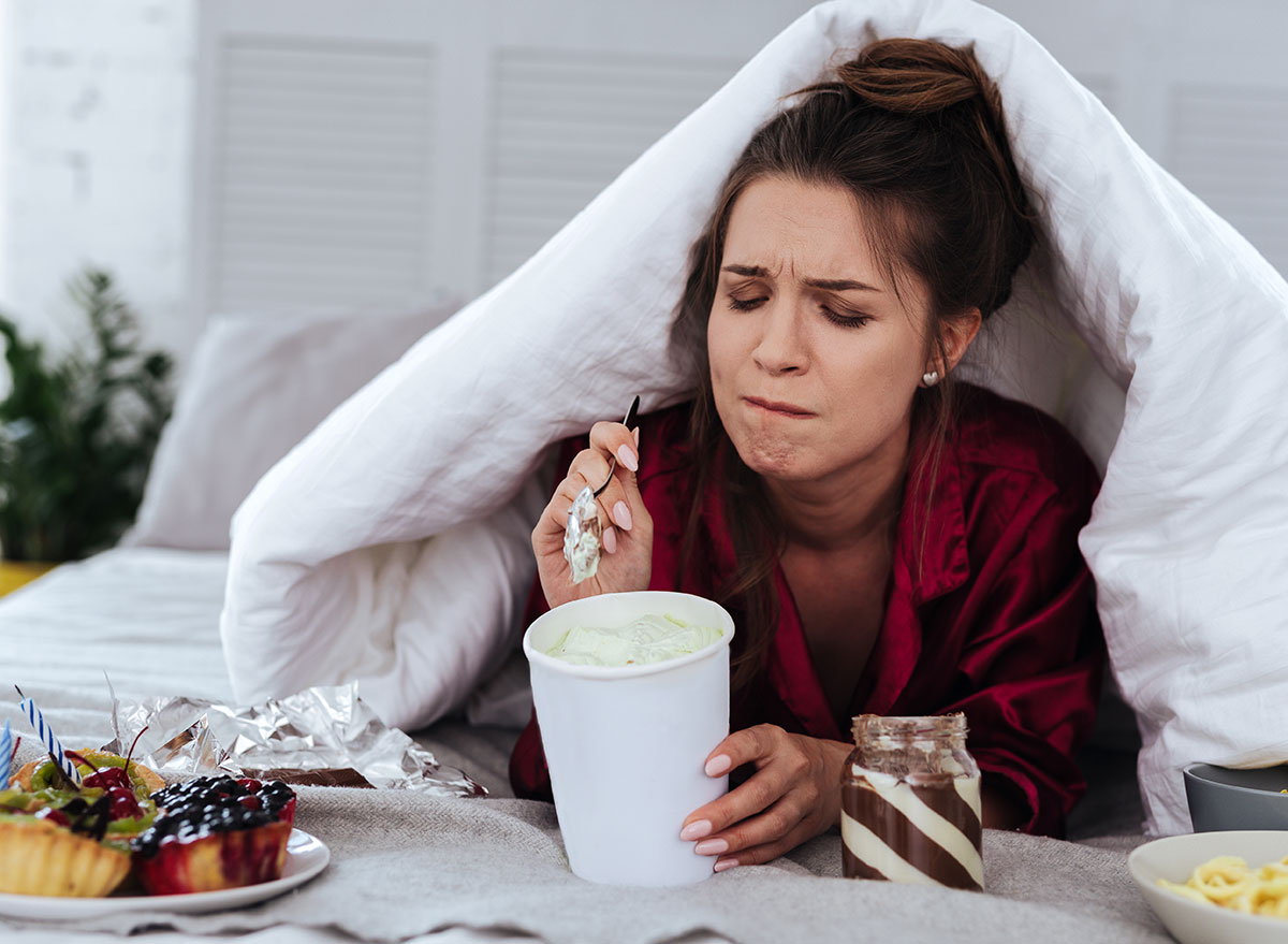 woman eating dessert