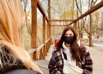 two girls wearing protective masks during coronavirus quarantine