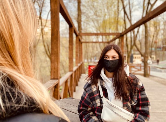 two girls wearing protective masks during coronavirus quarantine