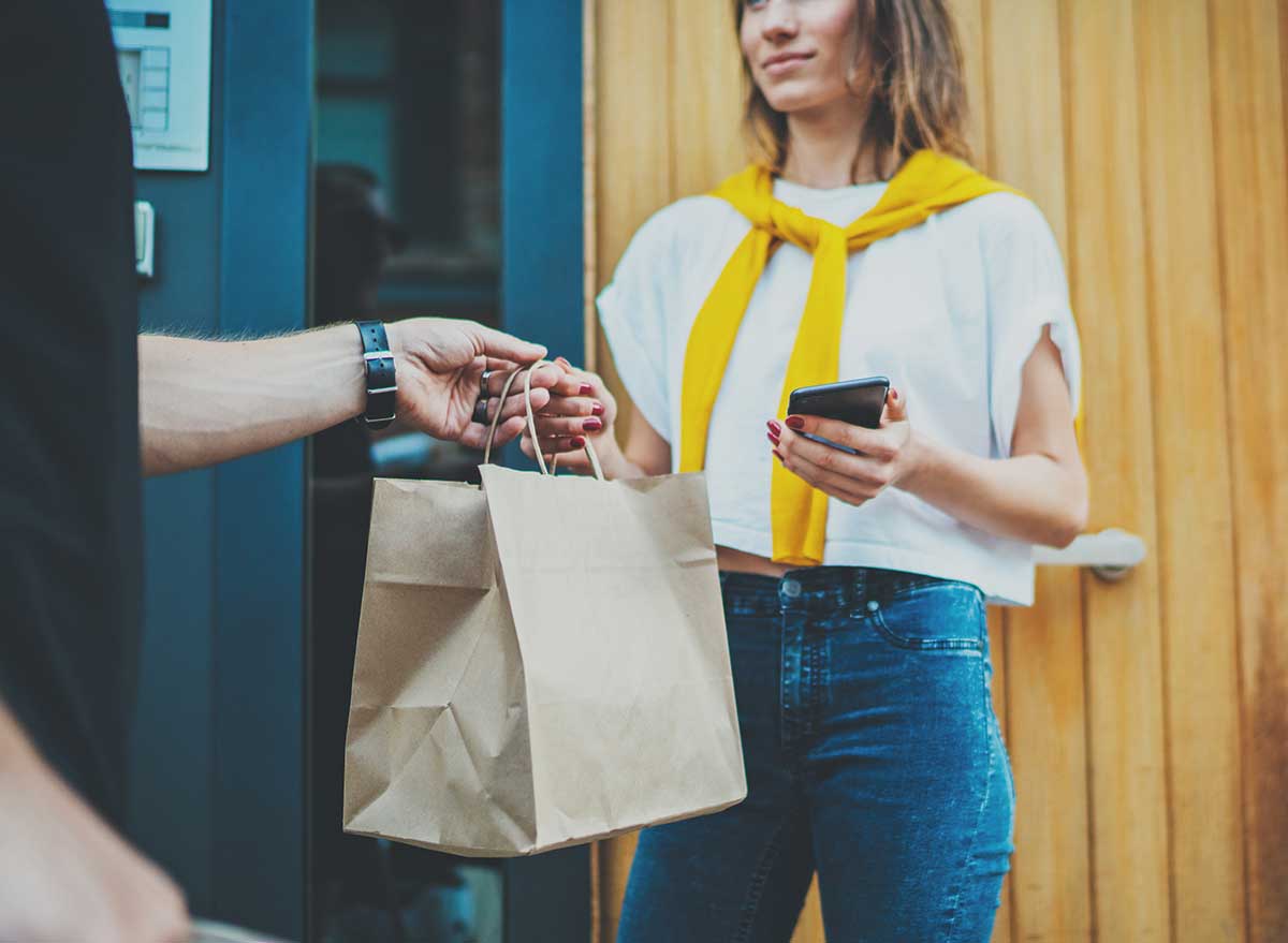 woman getting takeout