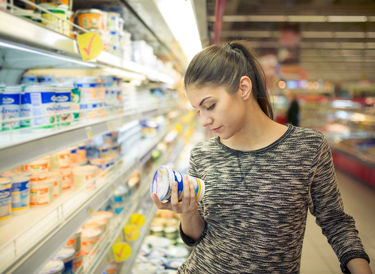 woman reading ingredients