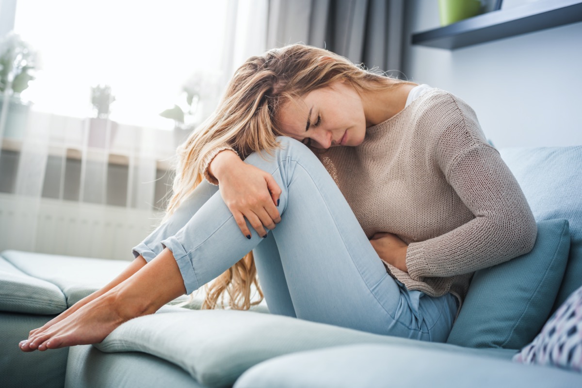 Woman stomach abdominal pain