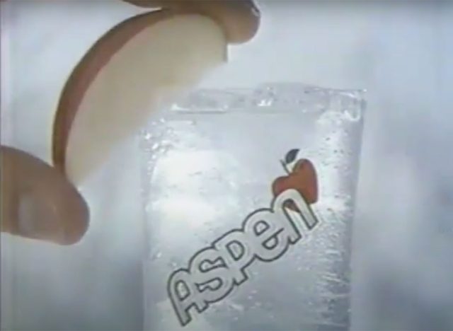 aspen soda in glass with apple slice