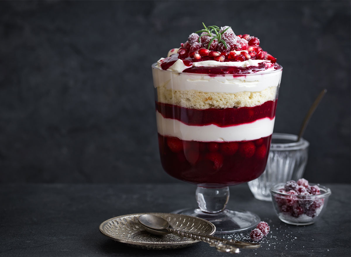 berry trifle in glass with spoons