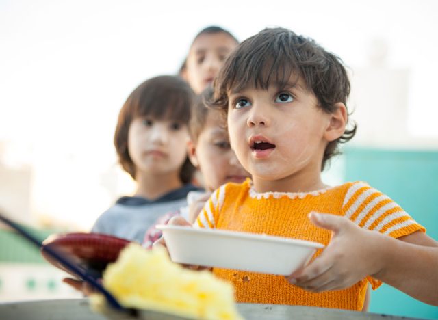 child being fed