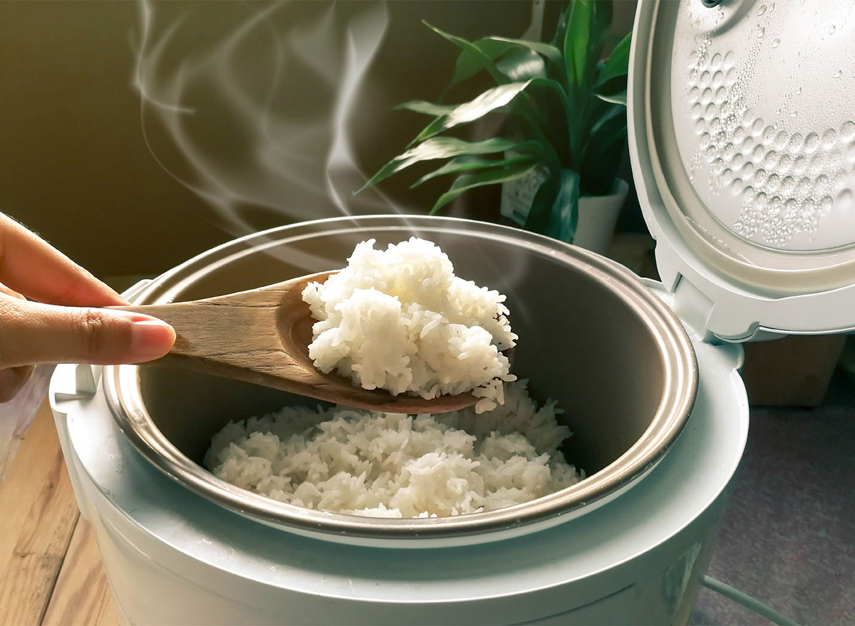 rice cooker with wooden spoon