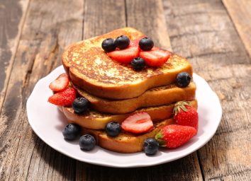 plate of french toast with berries