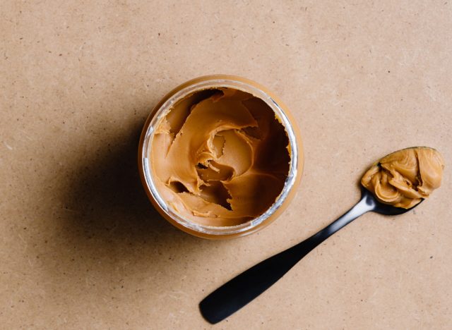 jar of peanut butter with spoon