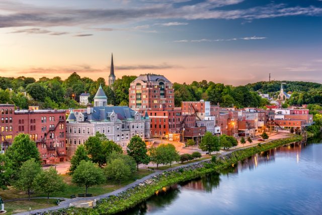 Augusta, Maine, USA downtown skyline on the Kennebec River.