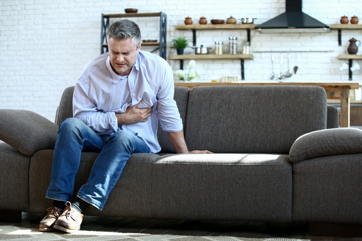 mature man having heart attack at home