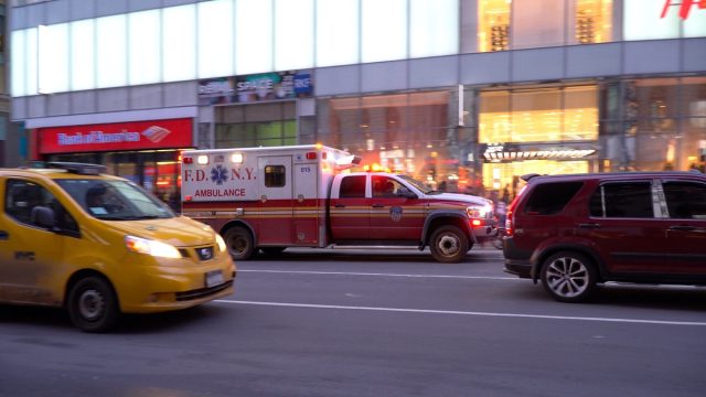 Ambulance in evening responding to an emergency medical situation in Manhattan