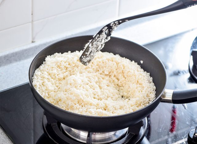 stirring rice stovetop
