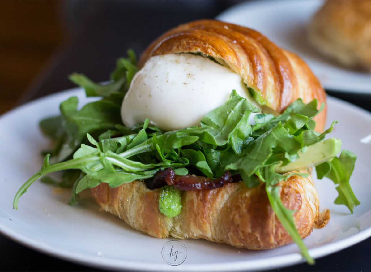 breakfast sandwich egg on croissant with bacon