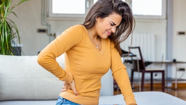 woman Having Spinal Or Kidney Pain