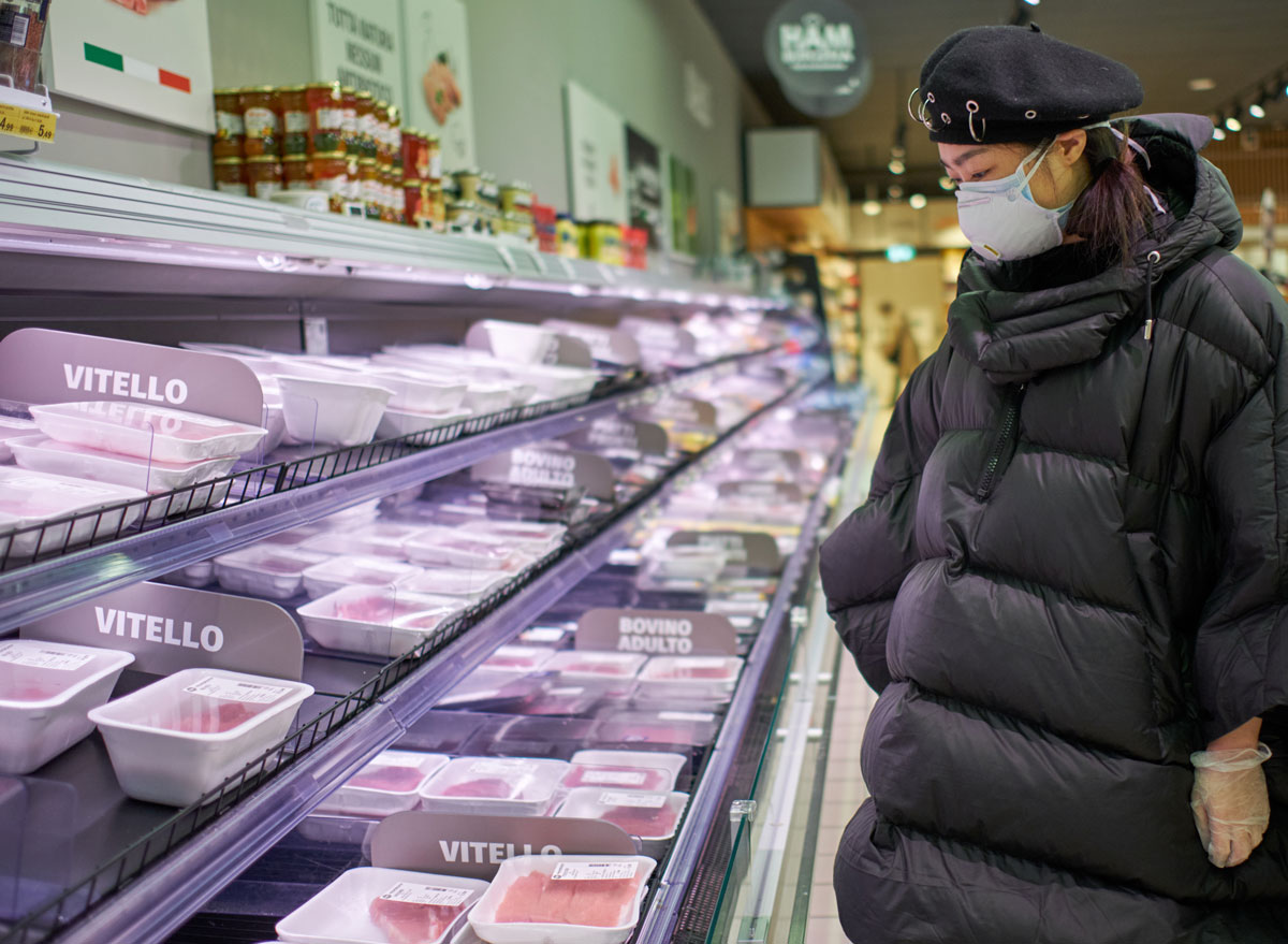 Woman shopping for meat