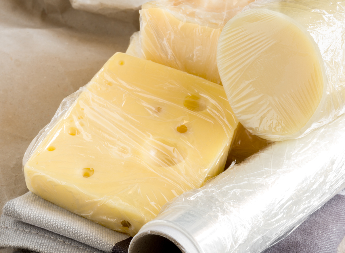 7 Side Effects of Eating Too Much Cheese, According to Experts Eat
