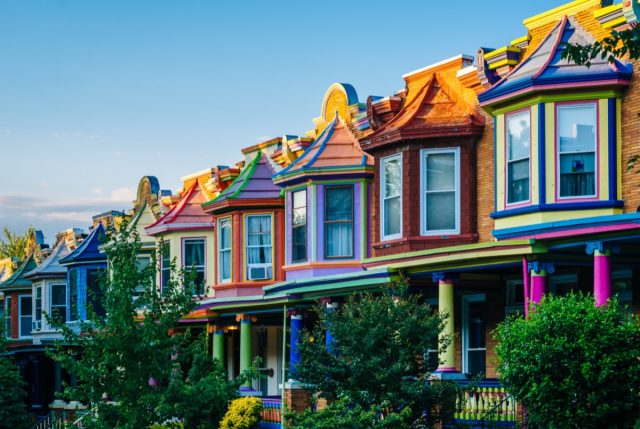 Colorful row houses on Guilford Avenue, in Charles Village, Baltimore, Maryland.