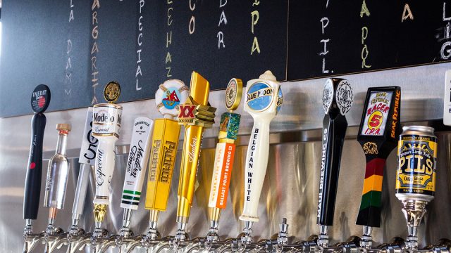 beer tap handles at bar