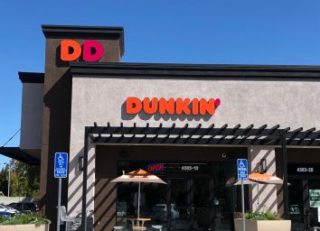dunkin donuts storefront with DD sign