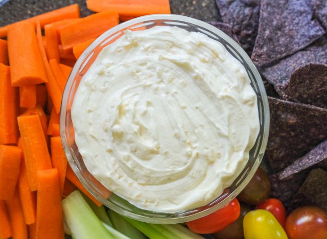 healthy french onion dip with chips and veggies