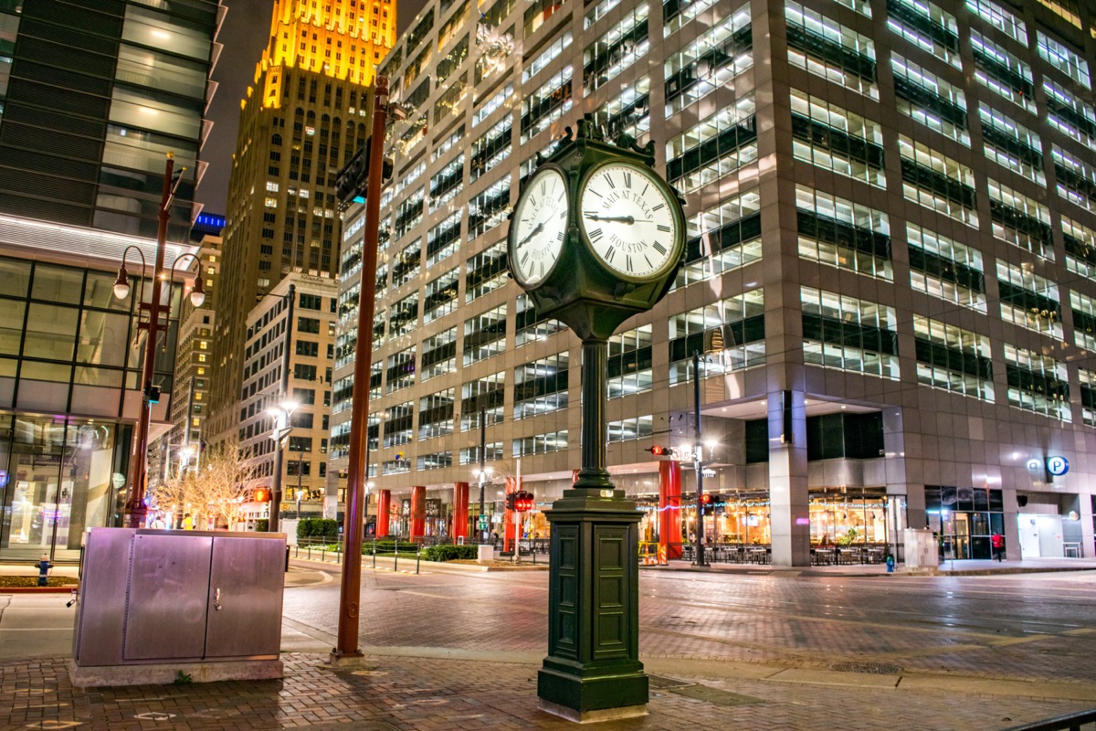 Historic City Clock at the Intersection of Main Street and Texas Street at Night Houston, Texas, USA