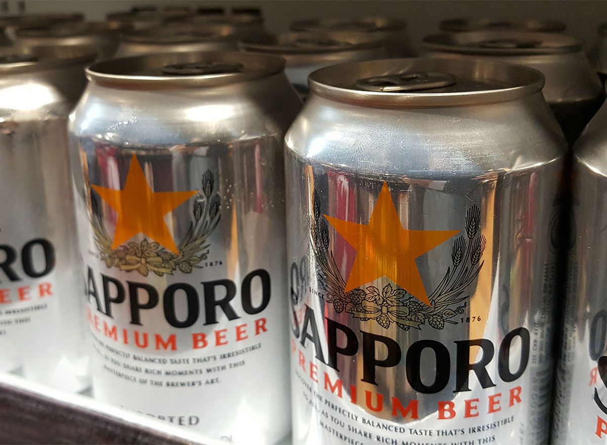 cans of sapporo beer on shelf