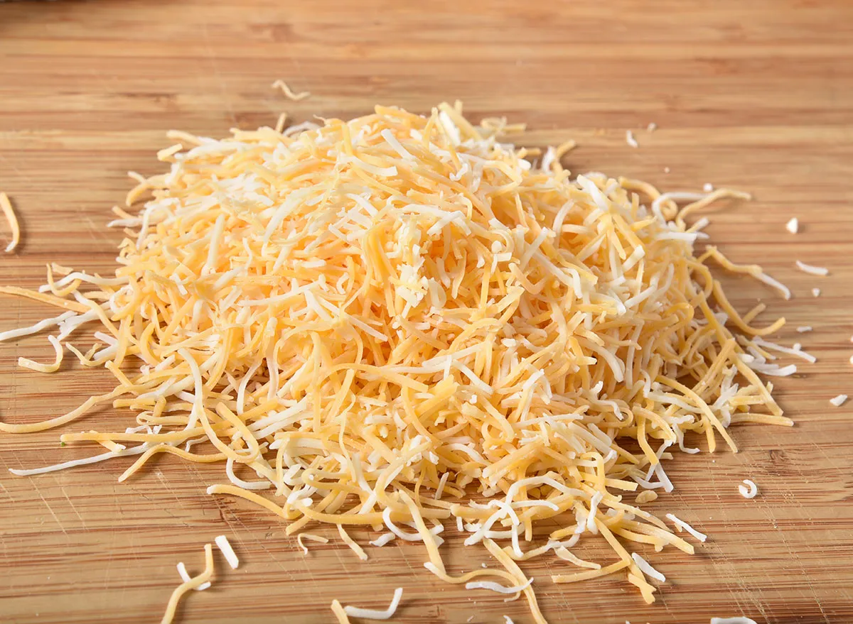 The Hidden Ingredient In Shredded Cheese — Eat This Not That