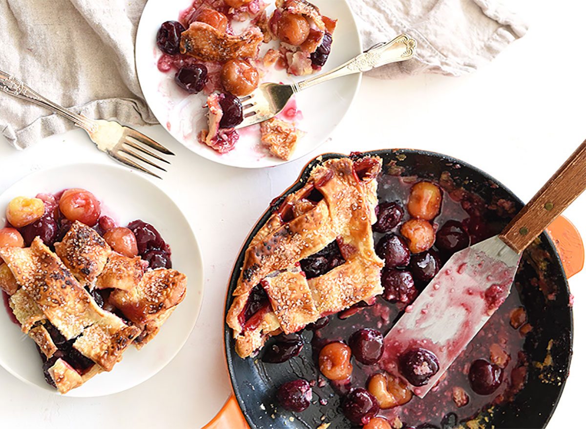 skillet cherry pie with slices on plates