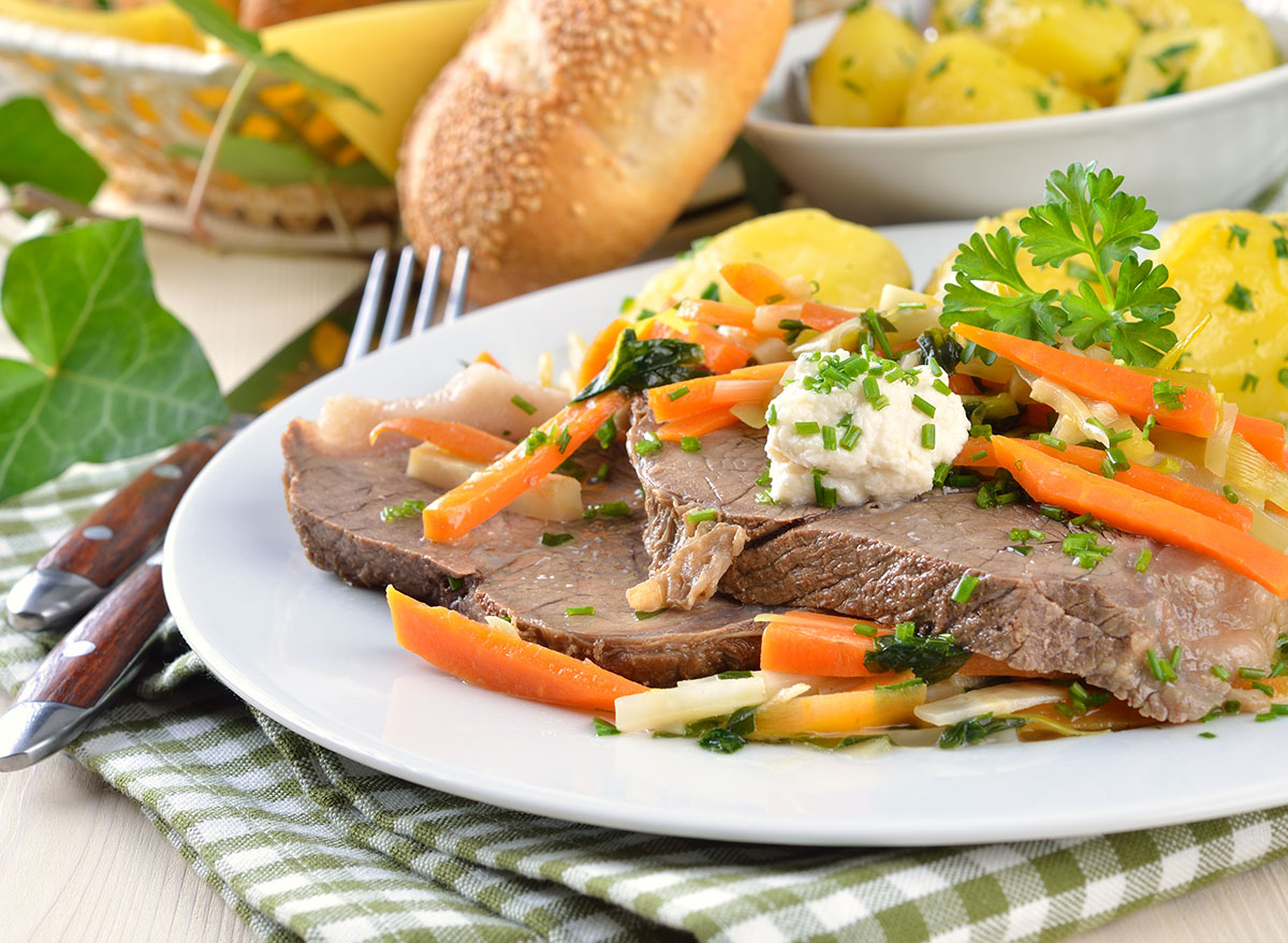 tafelspitz boiled beef with carrots on plate