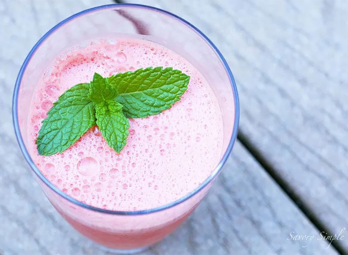 watermelon vodka spritzer in glass with garnish