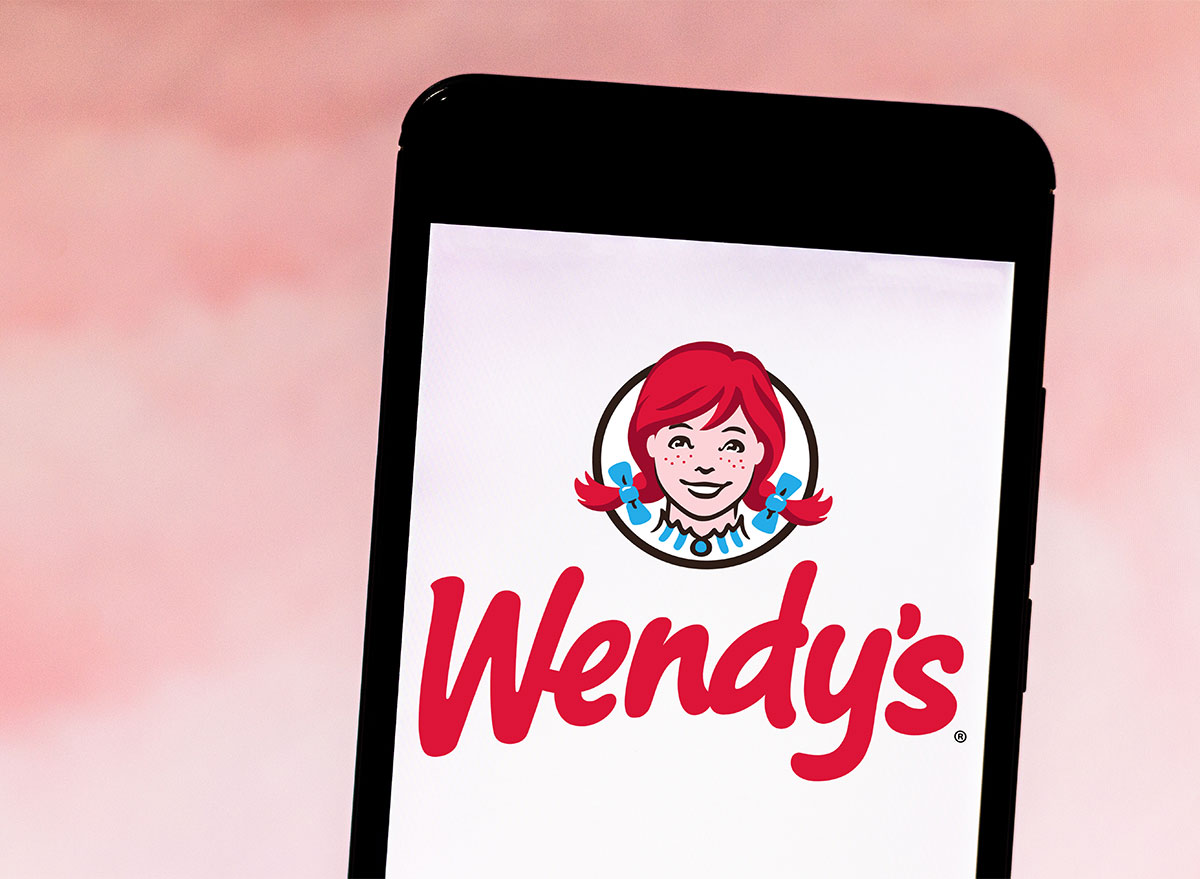 smartphone with wendys app on screen