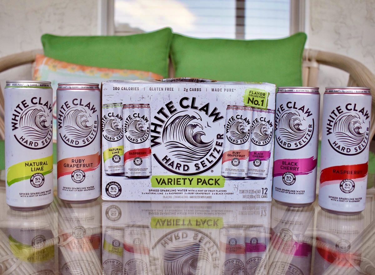 white claw spiked seltzer case with cans