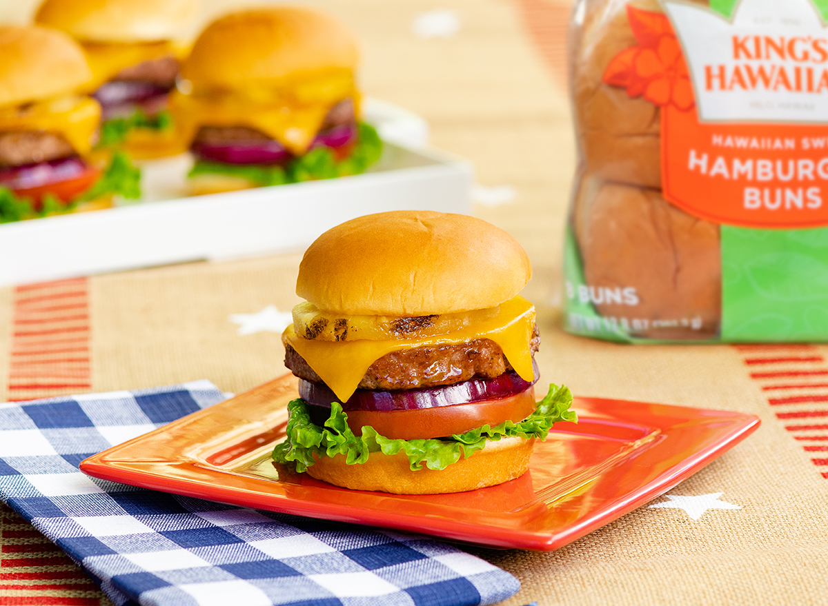 maui burger with grilled pineapple on a picnic table