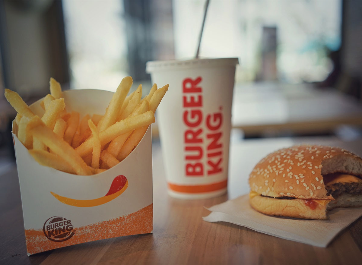 burger king fries drink and burger on table