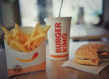 burger king fries drink and burger on table